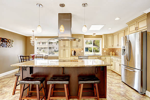 istock Beautiful kitchen island with granite top and hood 514616111