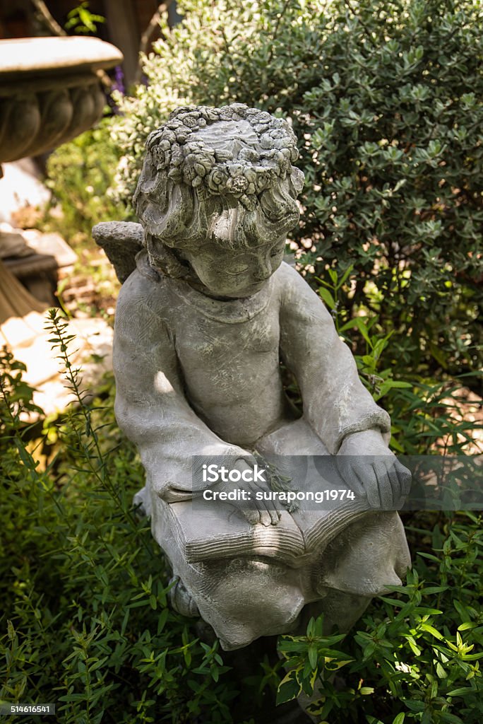 sculpture Cupid sculpture motion was reading. Ancient Stock Photo