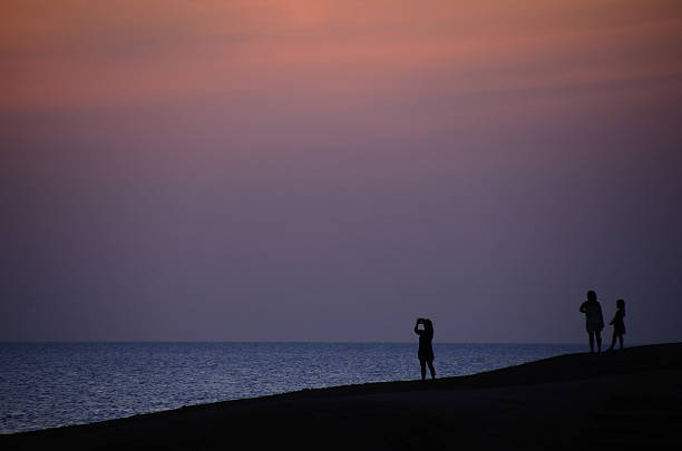 istock people sunrise at the sea 514617804