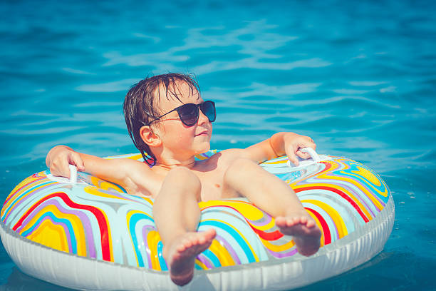 istock Child in the sea 514618510