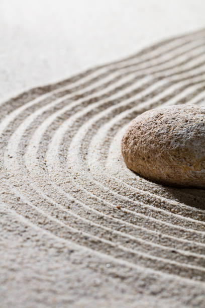 istock stone on sinuous waves for concept of relaxation or meditation 514622158