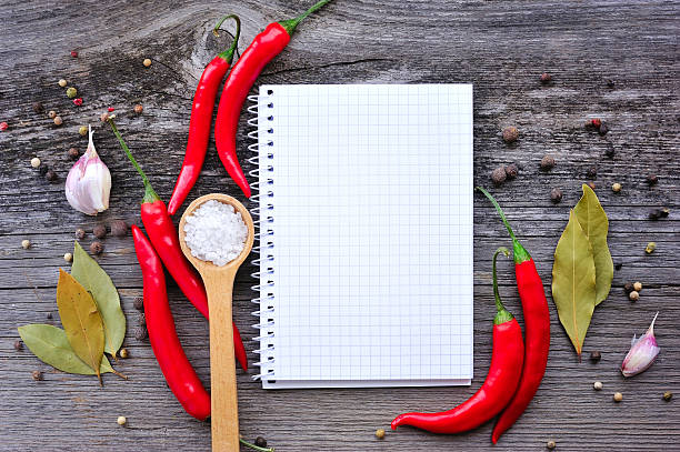 istock Vegetables and seasonings with open notebook for recipes 514622886