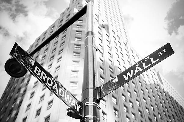 Wall Street and Broadway sign in Manhattan, New York. stock photo