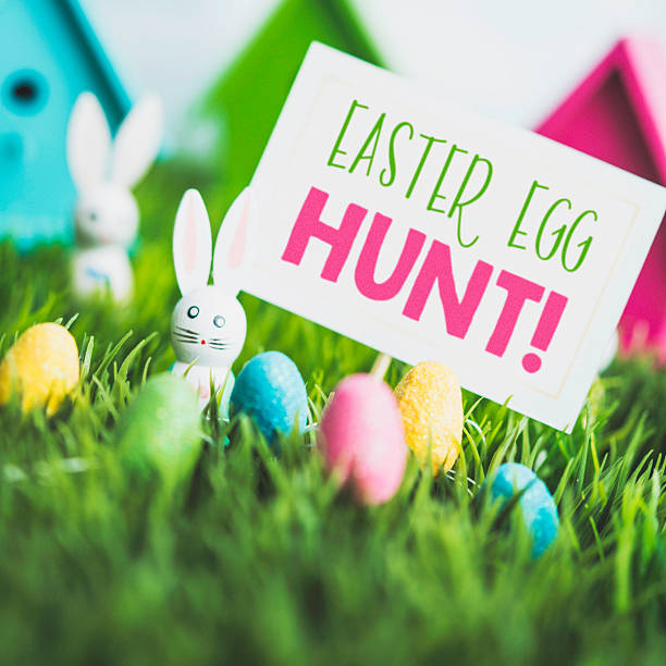 Easter egg hunt with vintage wood bunnies and Easter eggs