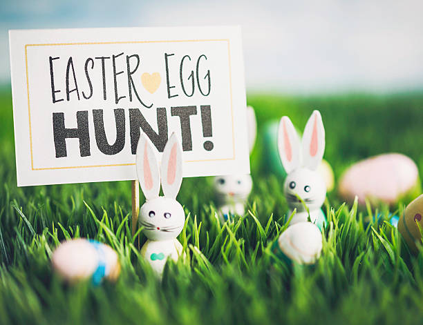 istock Easter egg hunt with vintage wood bunnies and Easter eggs 514626032