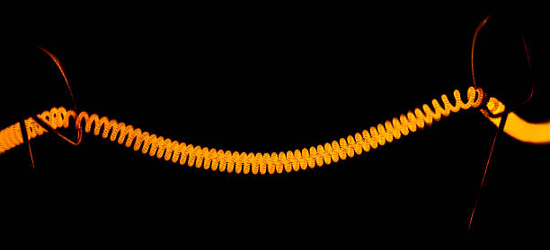 istock filaments in a vacuum inside of a bulb 514626498