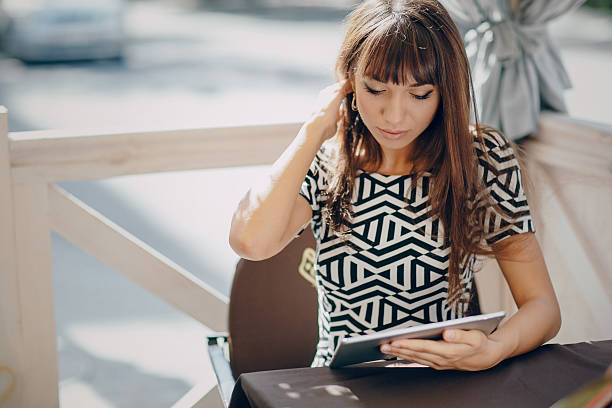 istock girl with phone 514626632