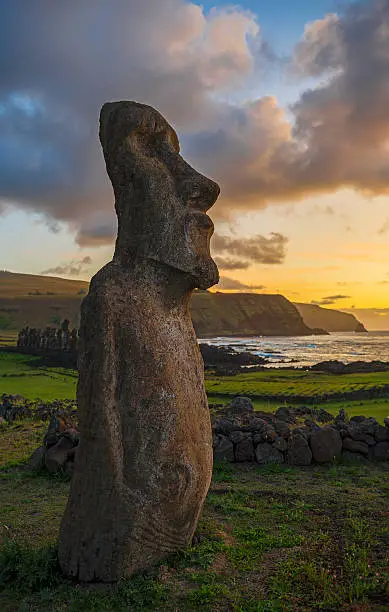 The Moai Huri Ote Hari at sunrise on Easter Island in Chile. 