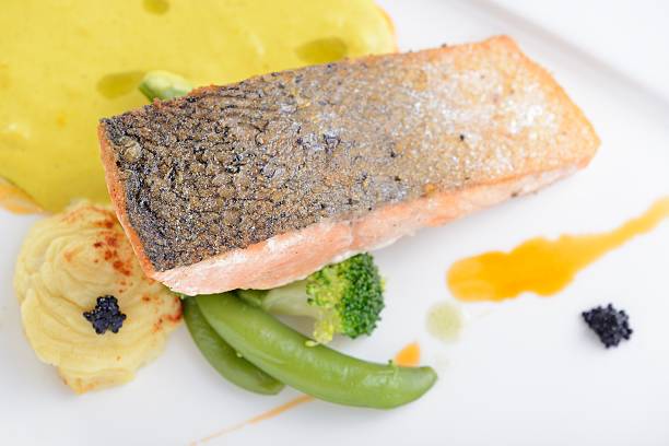 istock Fillet of salmon with mixed vegetables 514630374