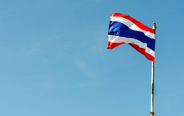 istock Thailand flag waving on the sky 514633011