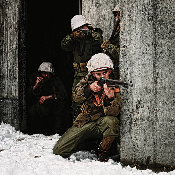 Group of WWII Winter Soldiers Taking Aim