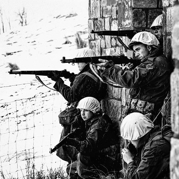 istock Group of WWII Winter Soldiers Taking Aim 514633040