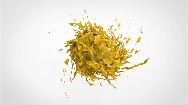 Shot of yellow paint splash, isolated on white background stock photo