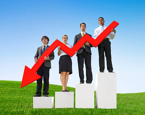 istock Angry Business People Holding Declining Line Graph on Bar Graph 514634807