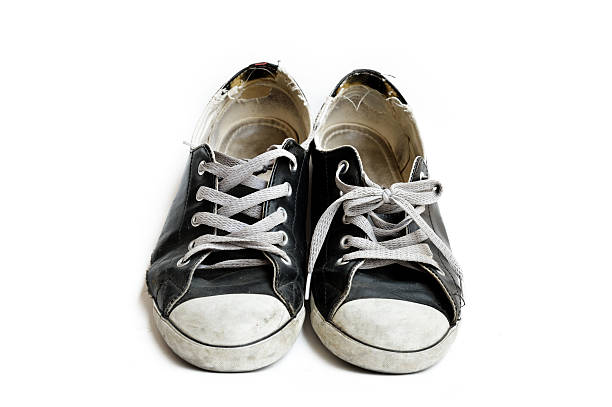 istock Travel with old shoes isolated on white background 514634882
