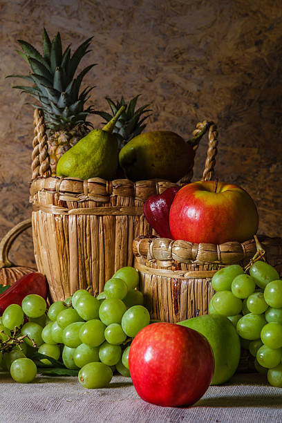 Still life with fruits placed in a basket  made ââof natural materials.