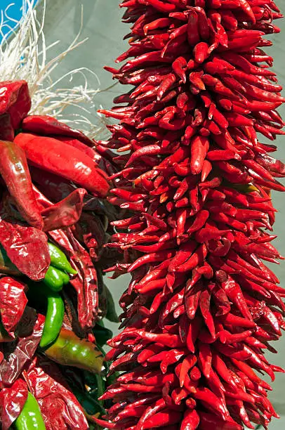 Chili pepper ristras hanging at farmers' market in New Mexico