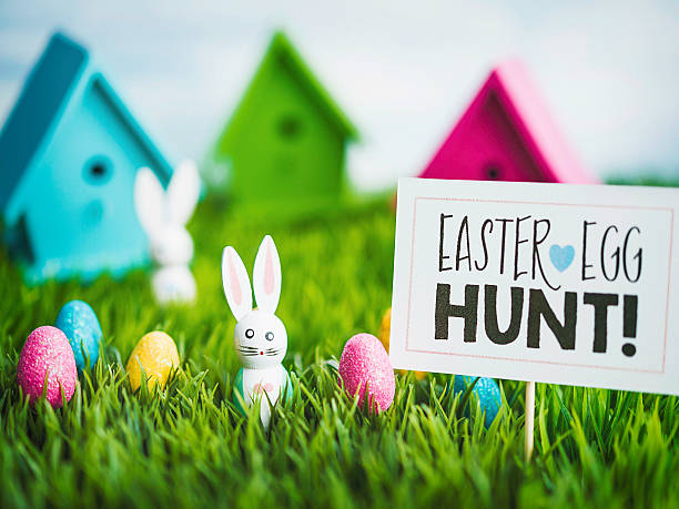 istock Easter egg hunt with vintage wood bunnies and Easter eggs 514638116