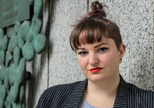 Young Confident White Business Woman A young white woman who looks confident and business like big fat lips stock pictures, royalty-free photos & images
