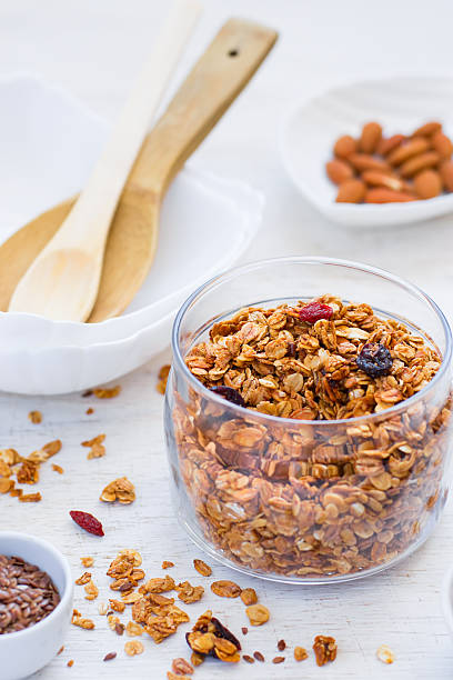 istock Granola with almonds on a white background, healthy breakfast. 514641200