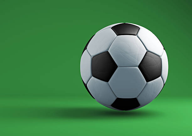 istock Soccer ball with shadows on green background. 514641342