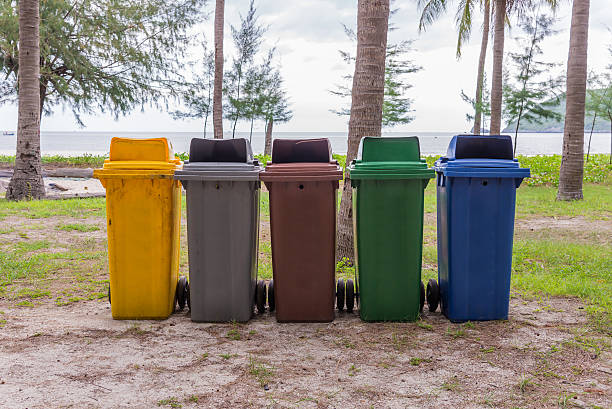 istock trash cans in park beside the walk way 514641762