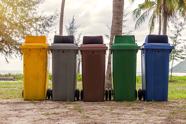 istock trash cans in park beside the walk way 514642534