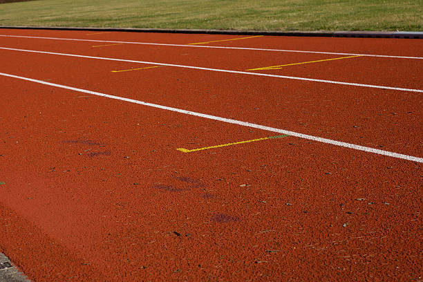 running track - grass area fotos stock-fotos und bilder