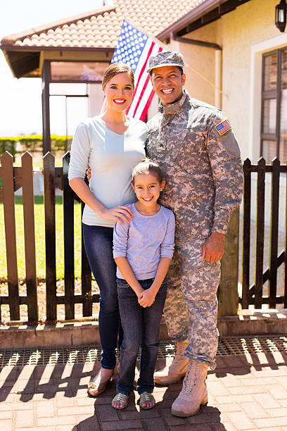 istock young military family standing together 514643296