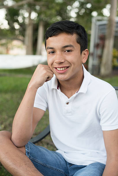 istock Happy Hispanic teenage boy 514643478