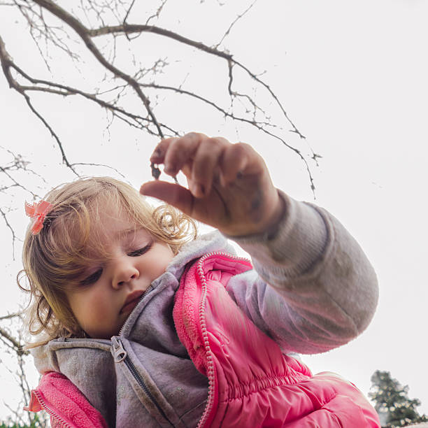 istock Baby girl playing in the backyard 514643802