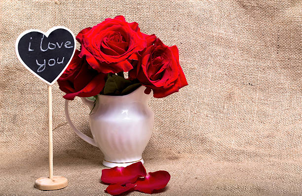 istock Red roses and mini-board with the text 