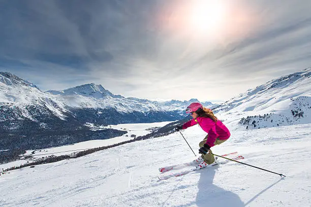 Female skier in downhill slope