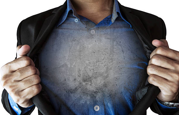 Businessman opening his suit, with concrete texture inside, isolated on white background