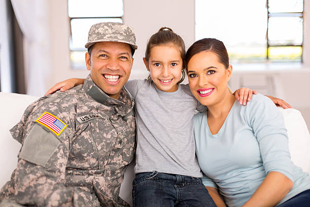 istock military family sitting on the couch 514645990