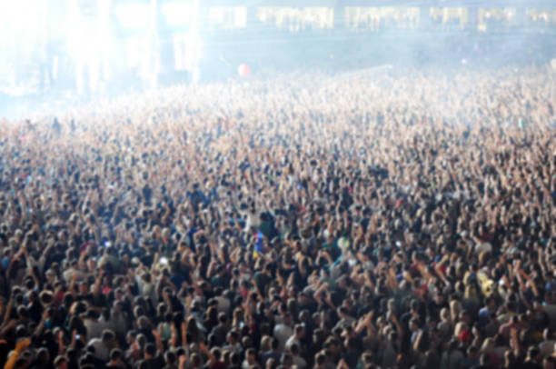istock Blurred crowd of people partying 514646940