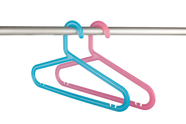 istock Pink and blue clothes hangers 514651383