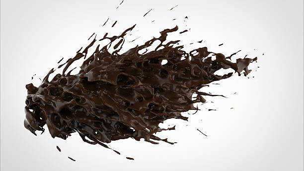 splash of brownish hot coffee or chocolate isolated on white stock photo