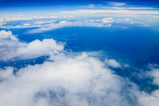 istock Blue Sky and Clouds on top of atmosphere 514656349