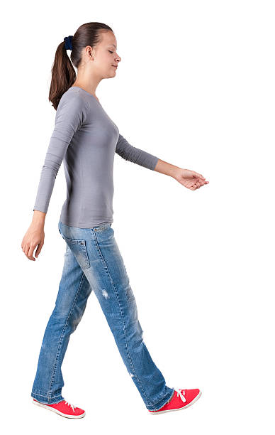 istock back view of walking  woman. 514656527