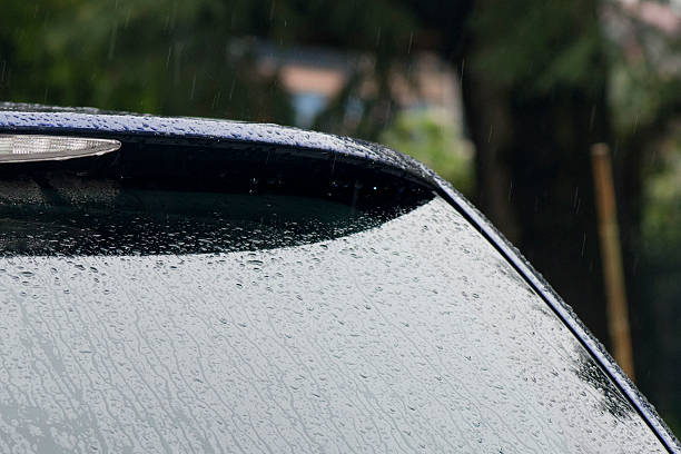 istock heavy rain on car glass window 514656641