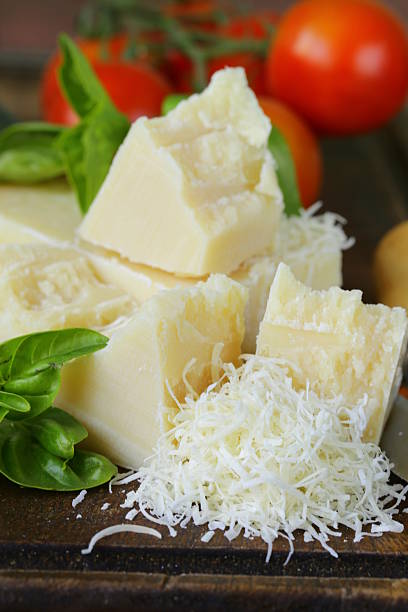 istock fresh tasty hard parmesan cheese on a wooden board 514656877