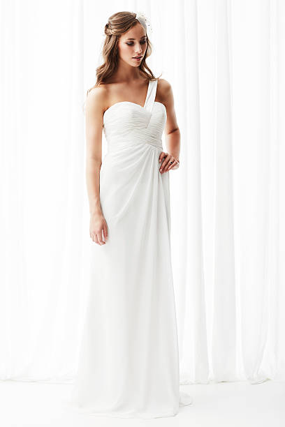 istock Young bride in wedding dress, studio shot 514657081