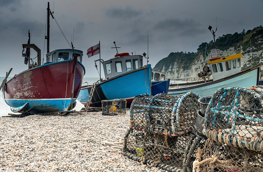 France. Basse-Normandie. Calvados. Trouville-sur-Mer. 07/08/2013. This colorful image depicts the fishing port at low tide in Trouville-sur-Mer.