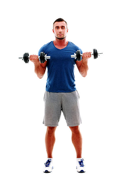 istock sportsman doing exercises with dumbbell 514671179