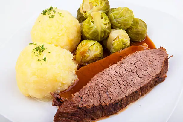 Sauerbraten with Klößen and Brussels sprout