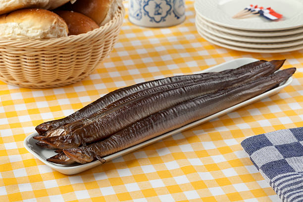 dish with smoked eel - paling nederland stockfoto's en -beelden
