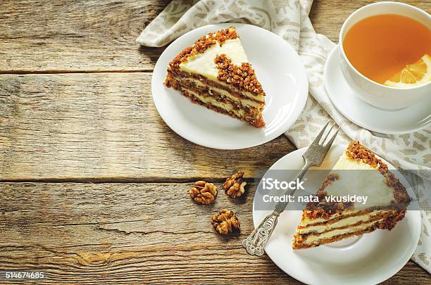 Carrot Cake With Raisins Walnuts And Butter Cream Stock Photo - Download Image Now - Autumn, Baked Pastry Item, Baking