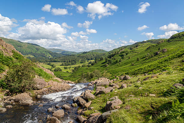 Easedale Beck looking towards Grasmere The view from the waterfall looking towards Grasmere, The lake District, Cumbria, England grasmere stock pictures, royalty-free photos & images