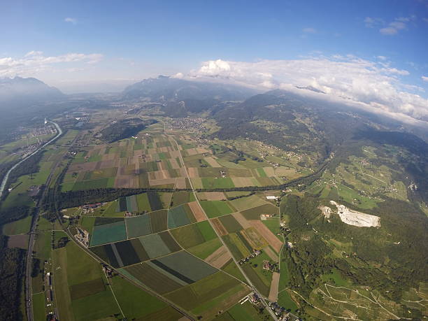 vue aérienne du valais, de vaud - aerial view mid air farm field photos et images de collection